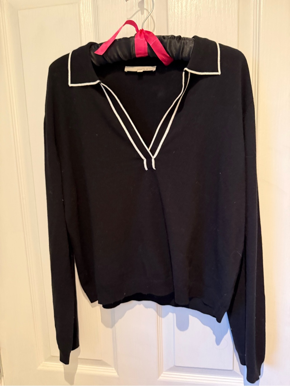 Black Polo-Style Sweater with White Trim